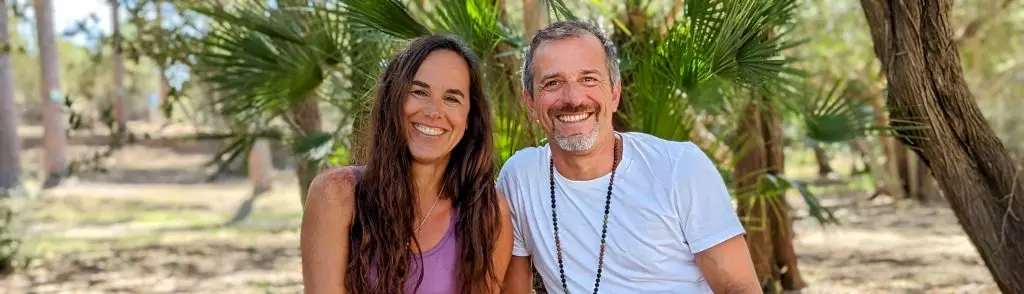 Fabio & Julia Giaccone, founders of the Ananda Yoga Trainings, smiling at the camera